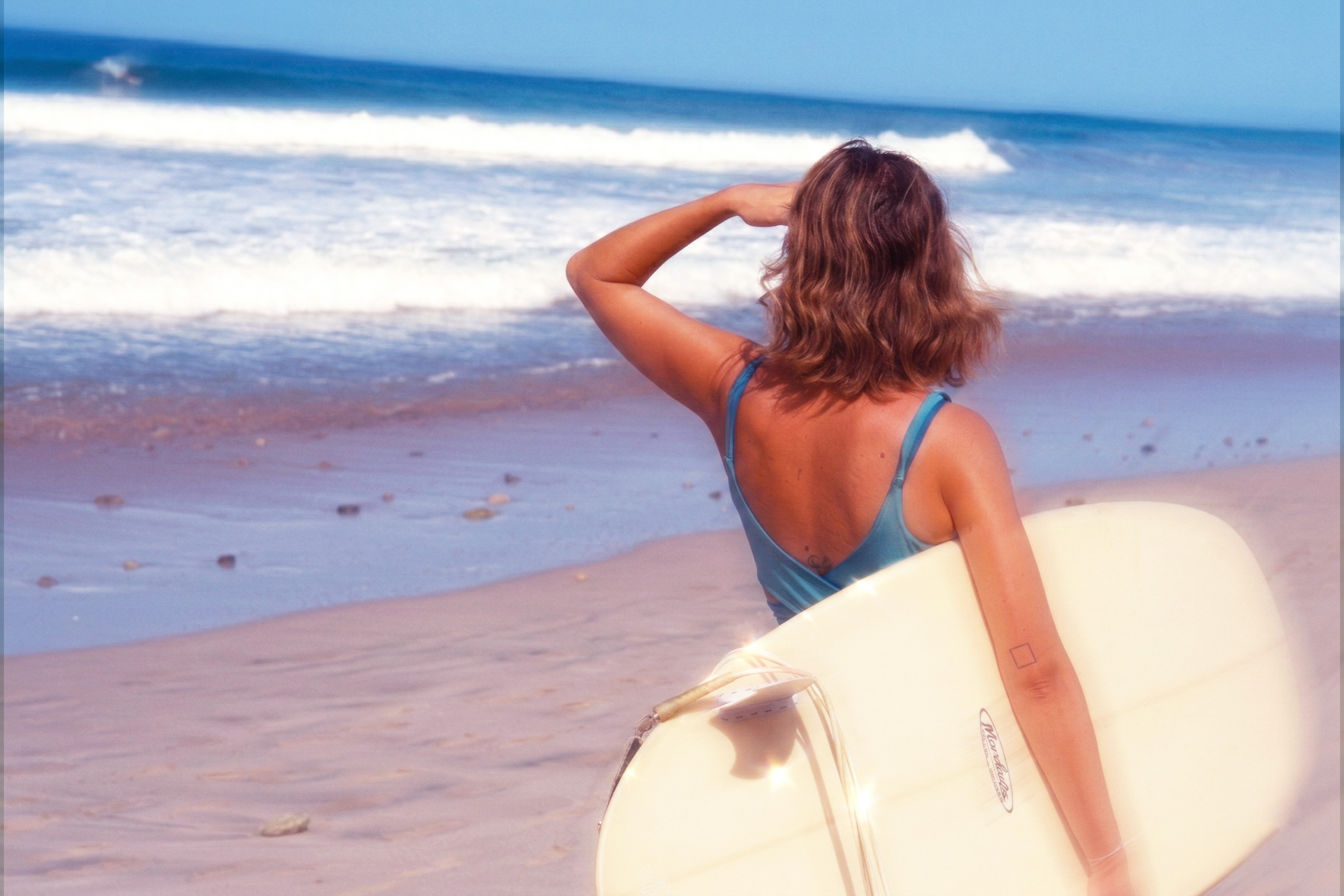 Surfer watching the waves